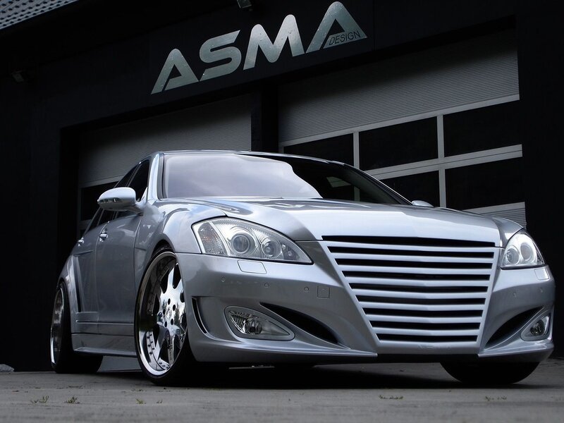 Silver Modified Sedan — Dramatic, Photograph, Car, Building, Garage Door