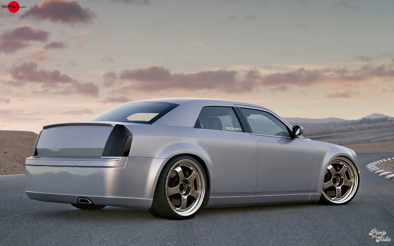 silver modified sedan on track