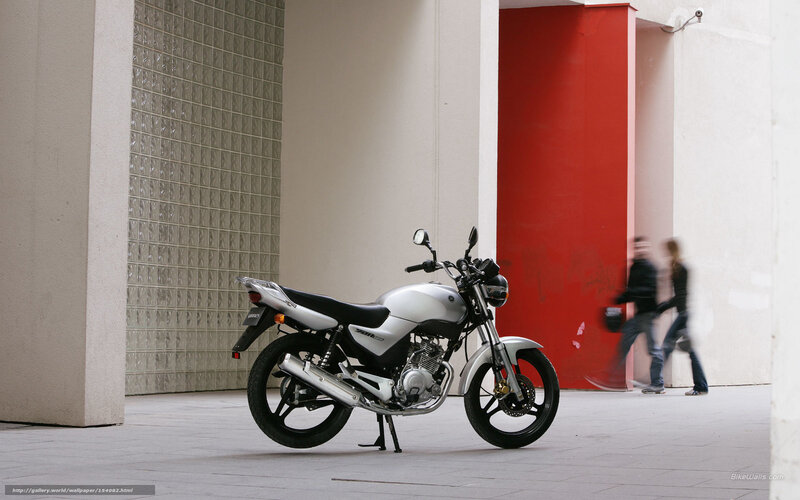 Silver motorcycle in urban setting