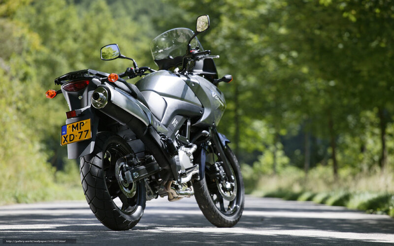 Silver motorcycle on a road