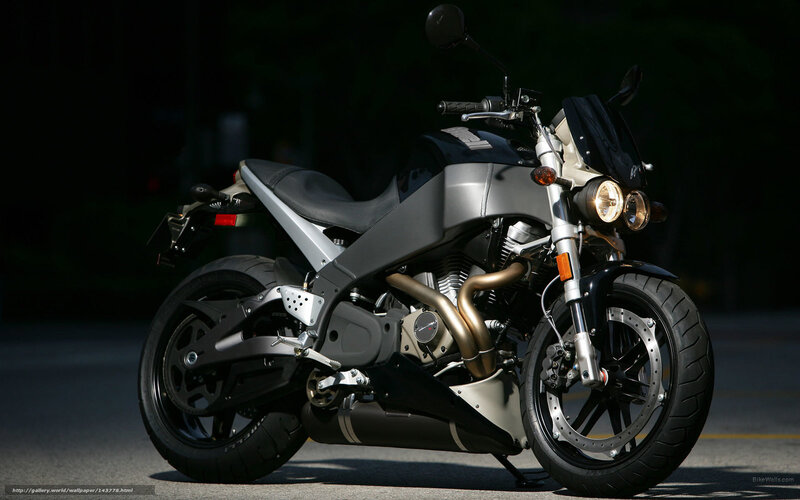 silver motorcycle on asphalt