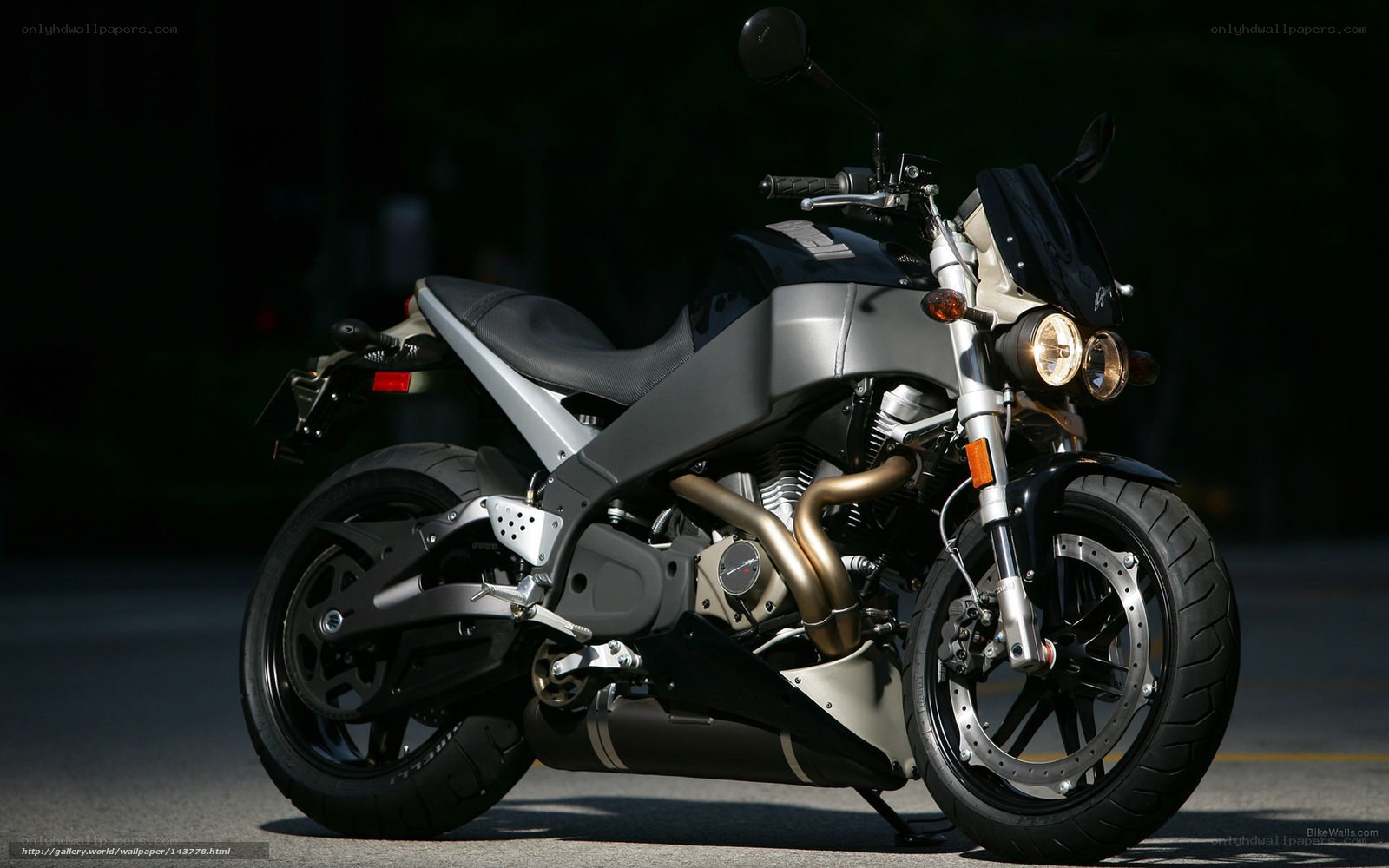 silver motorcycle on asphalt