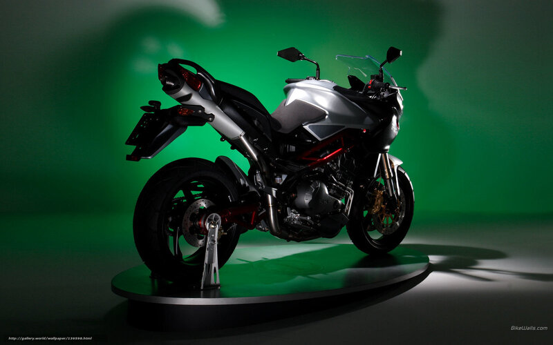 silver motorcycle on display