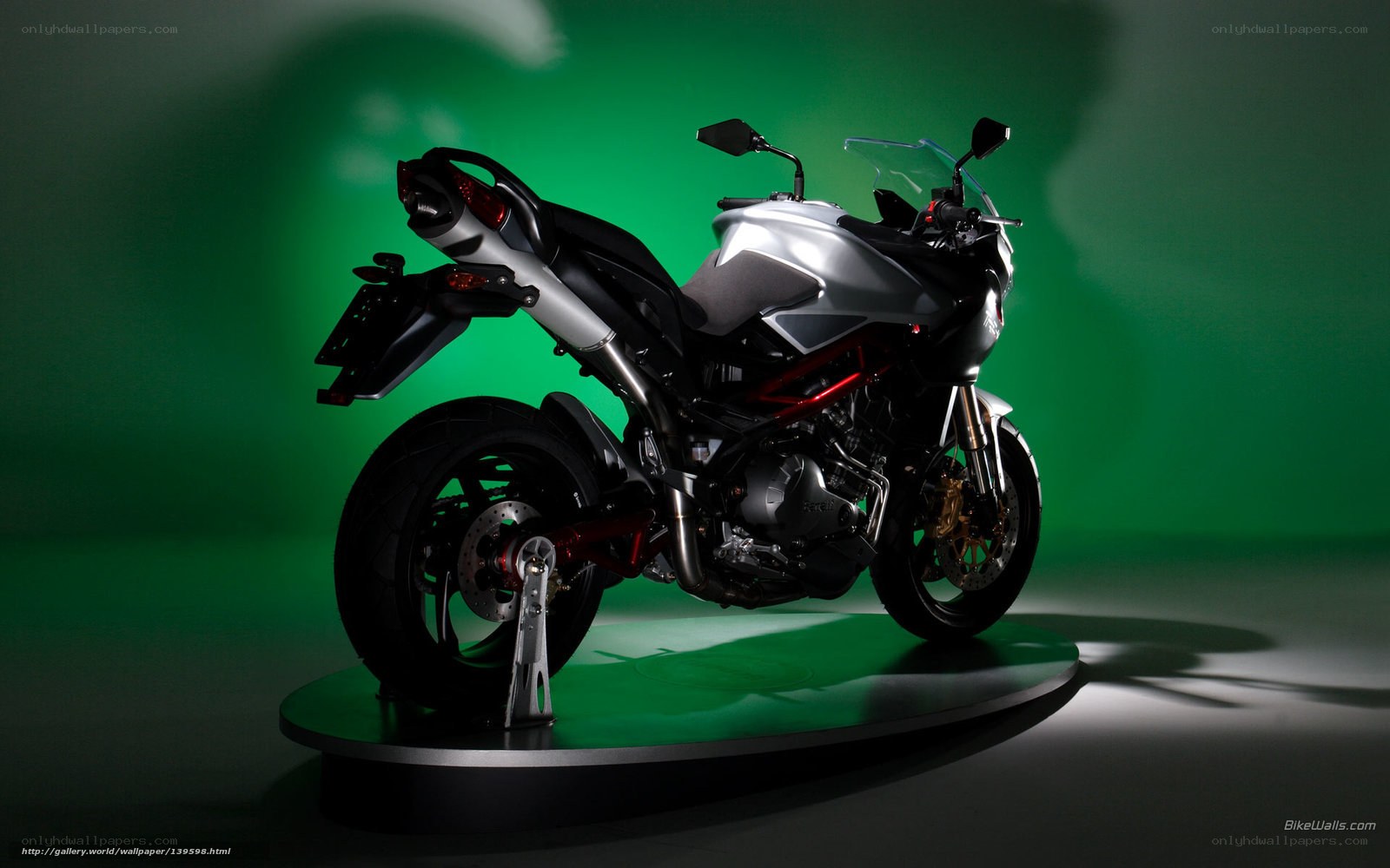 silver motorcycle on display