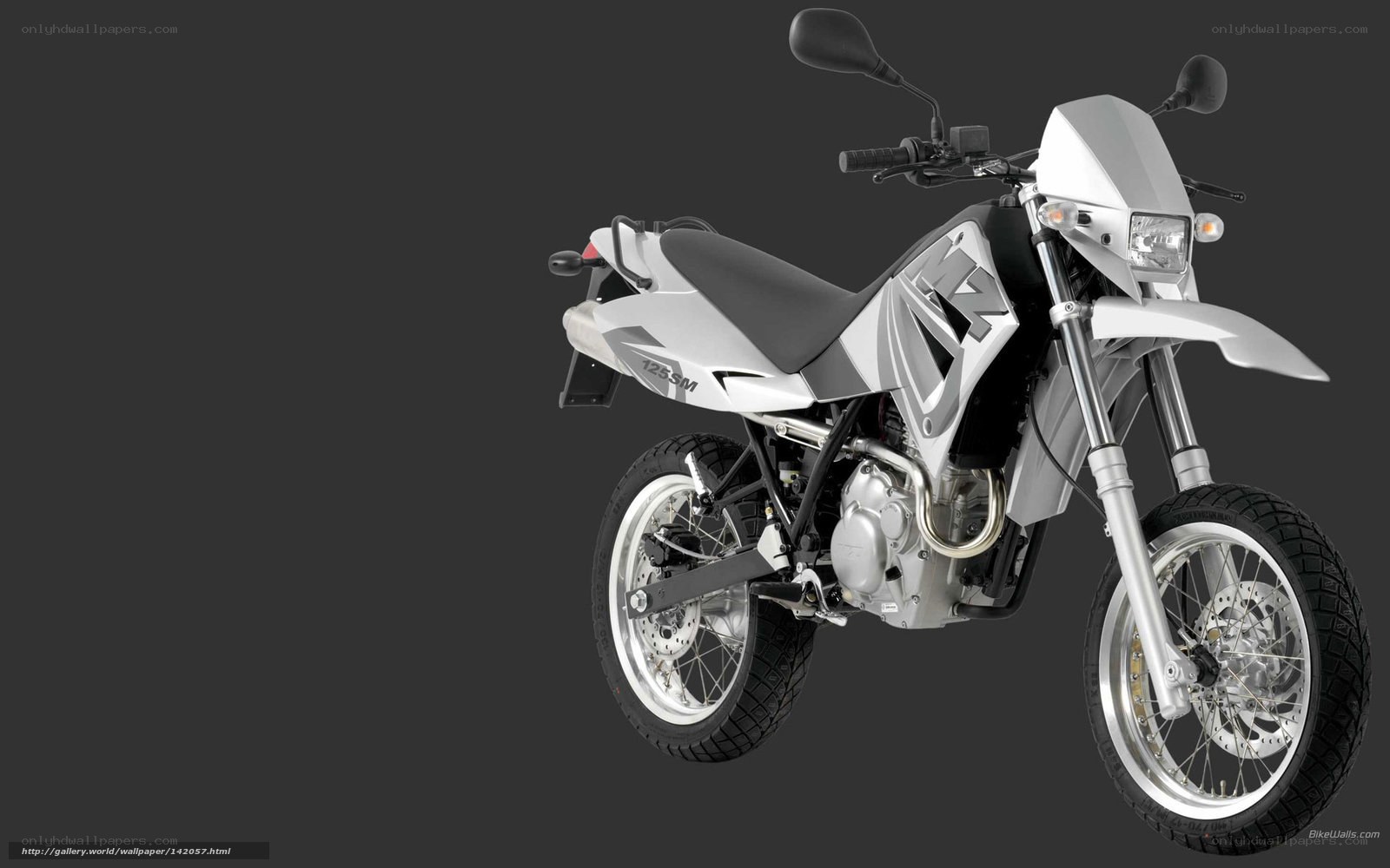 silver motorcycle on gray background