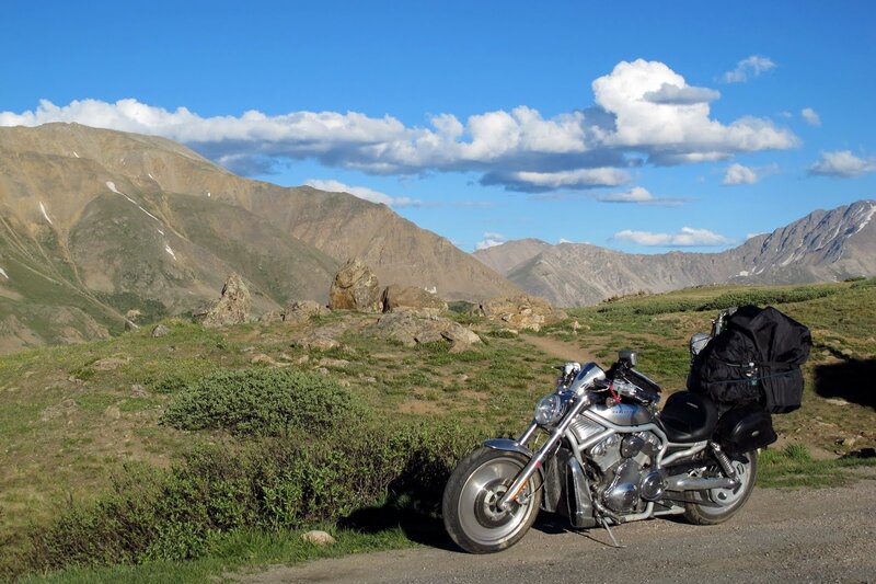 Silver Motorcycle on Mountain Road