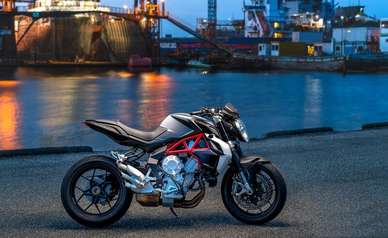 Silver Motorcycle on Pavement