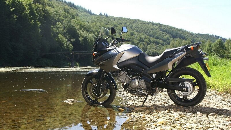 Silver Motorcycle on Riverbank — Gray