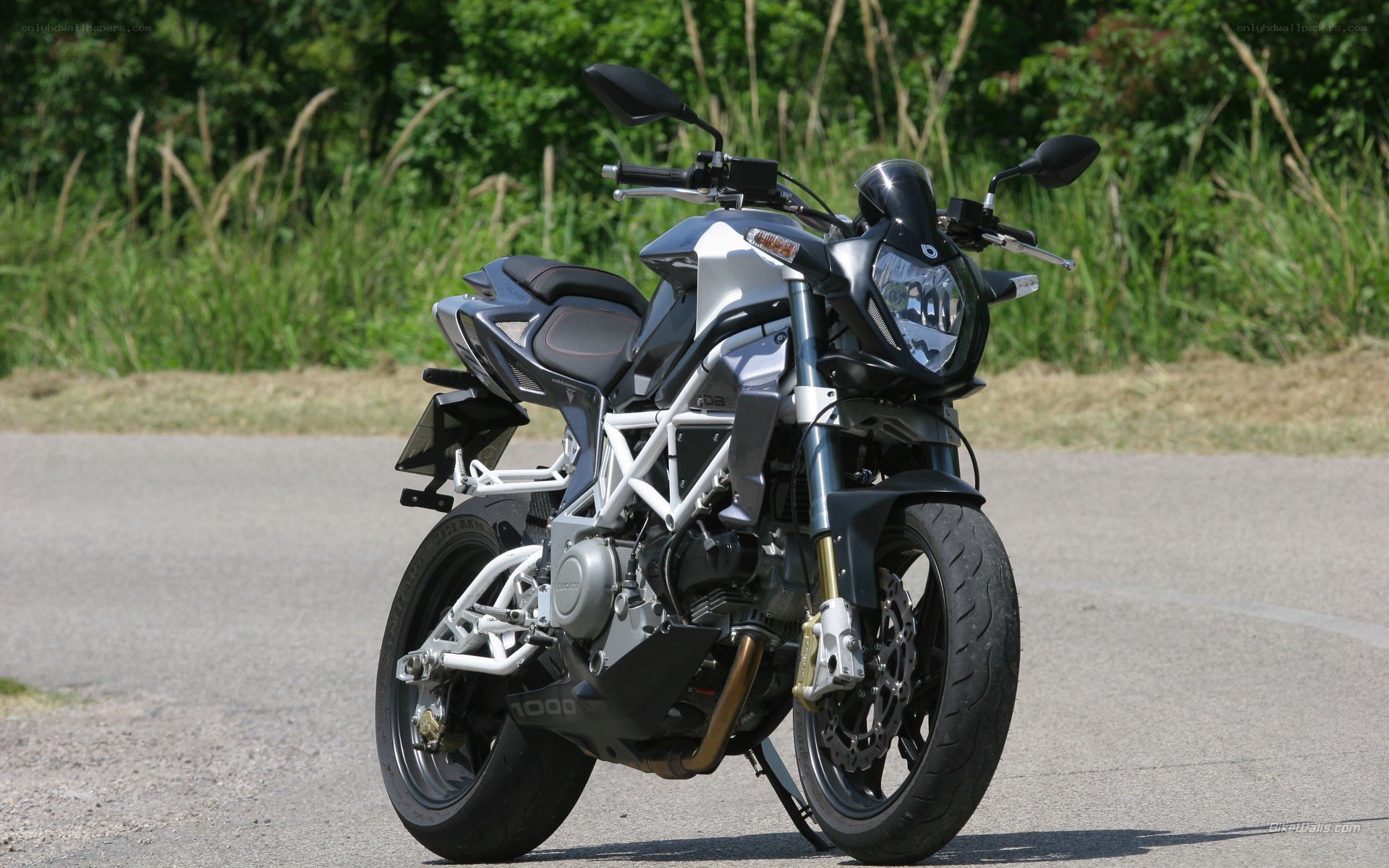 silver motorcycle on road