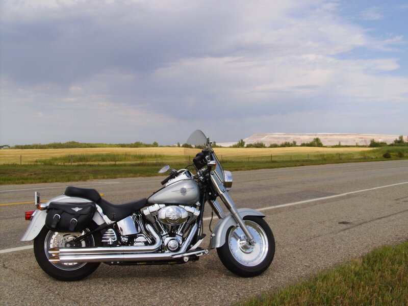 Silver Motorcycle on Road — Gray
