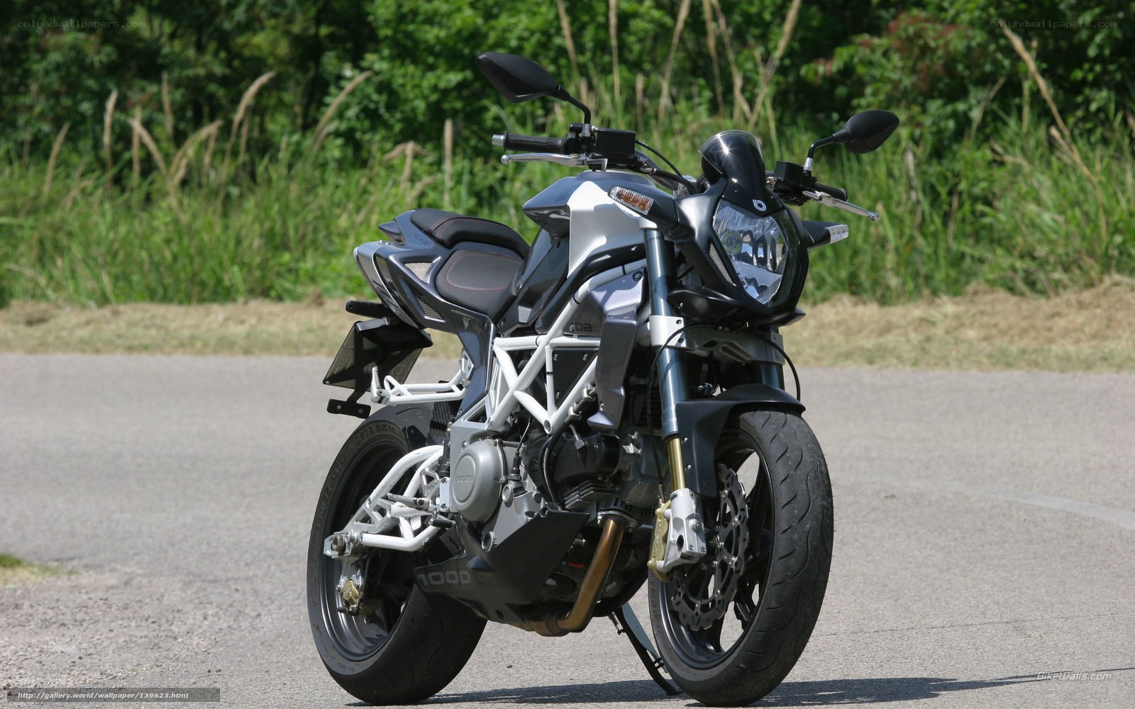 silver motorcycle on road