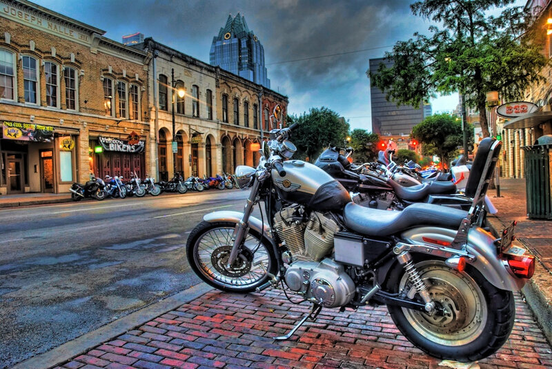 Silver Motorcycle on Sidewalk