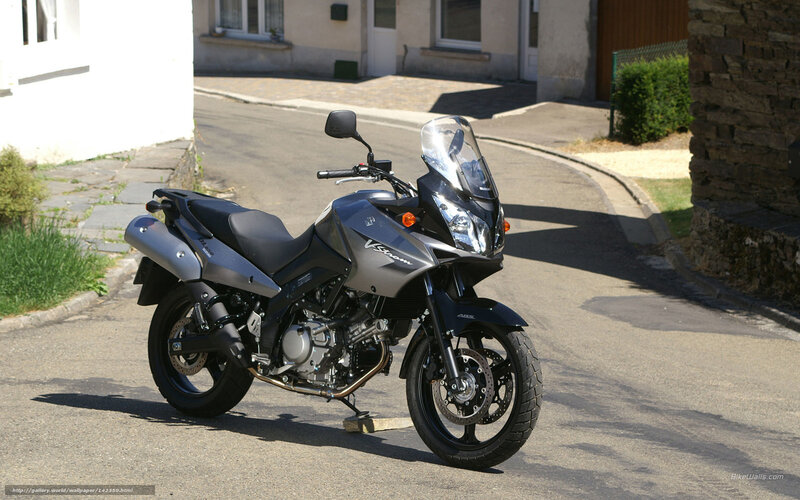 Silver Motorcycle on Street