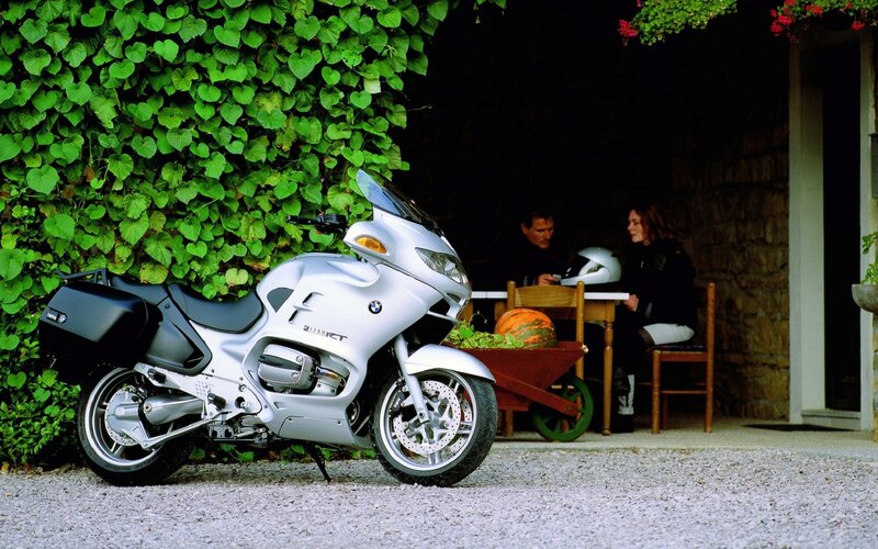 Silver motorcycle parked outside