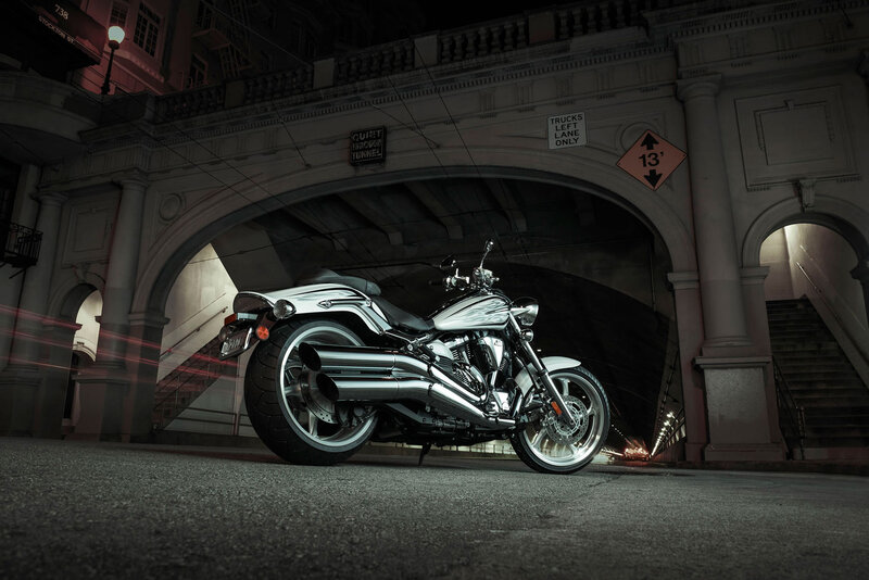 Silver Motorcycle under Bridge
