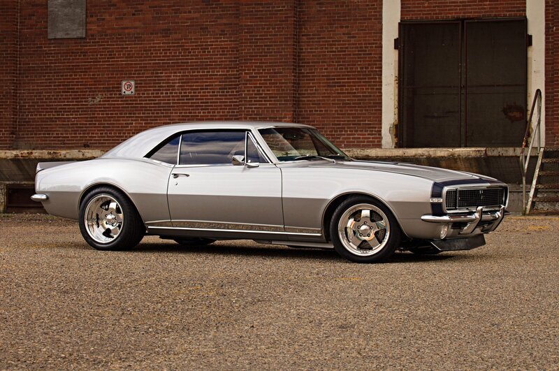 Silver Muscle Car — Dramatic, Afternoon, Photograph, Brick Building
