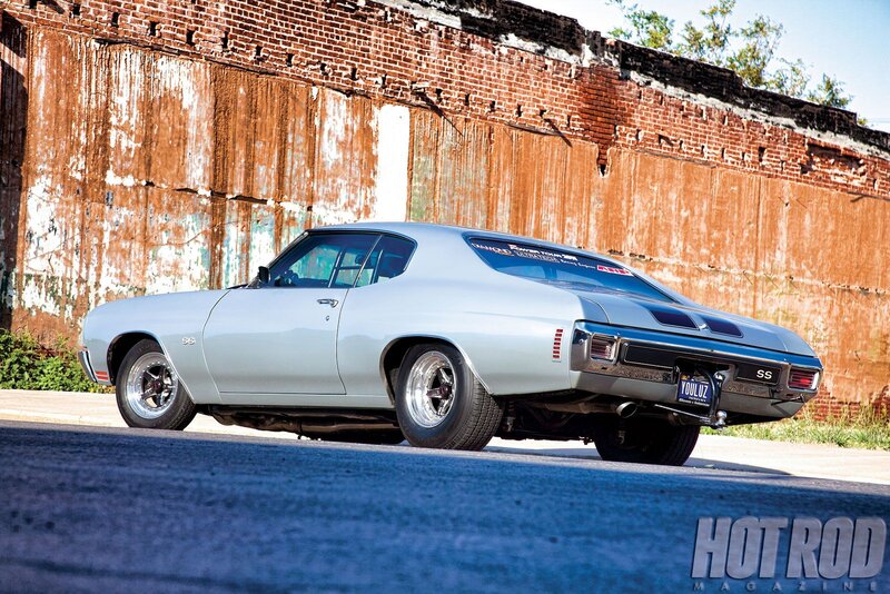Silver Muscle Car — Dramatic, Afternoon, Photograph, Brick Wall