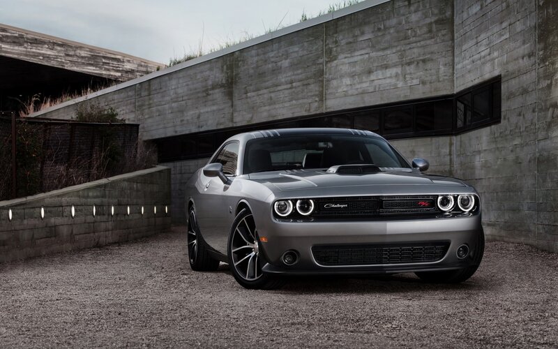 Silver Muscle Car — Gray, Dramatic, Photograph, Concrete Wall, Gravel Ground