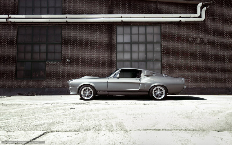 silver muscle car in alley