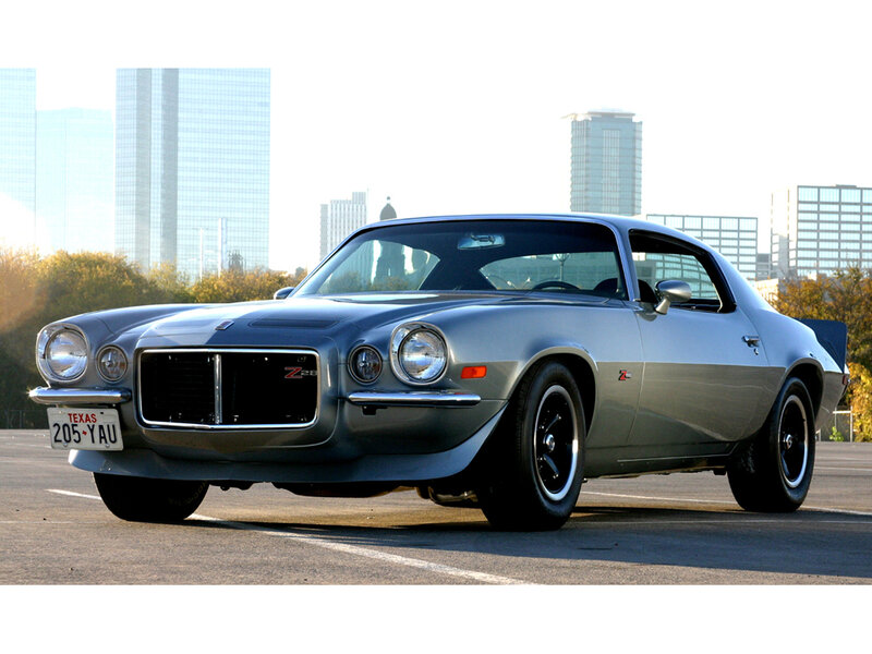 Silver muscle car in city