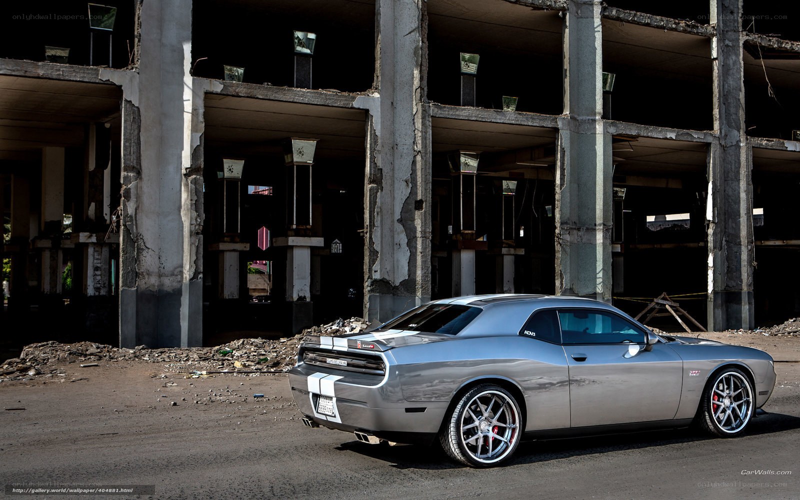 Silver muscle car in ruins