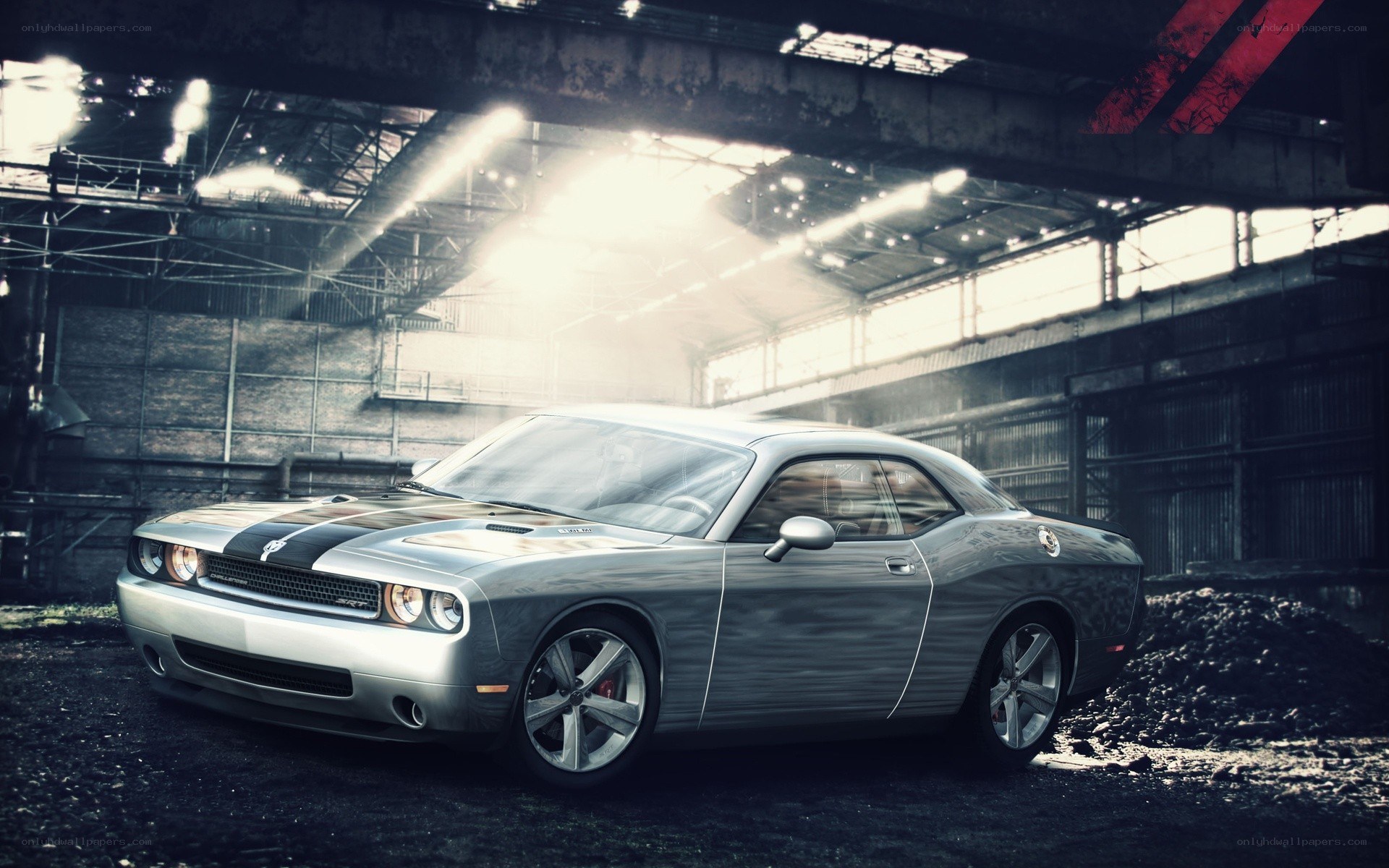 Silver muscle car in warehouse