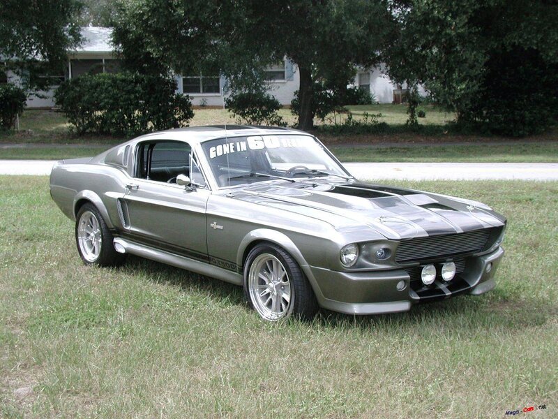silver muscle car on grass