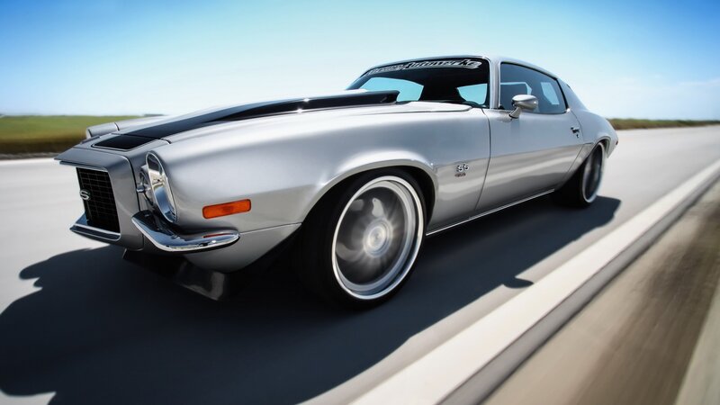 silver muscle car on road