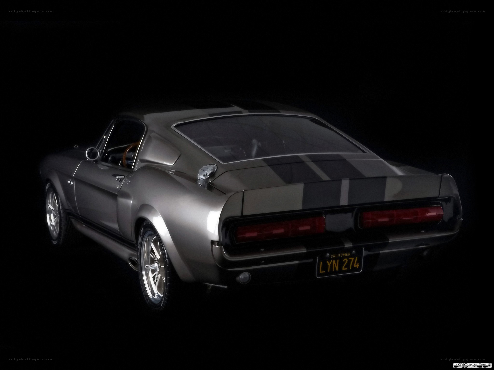 silver muscle car rear view