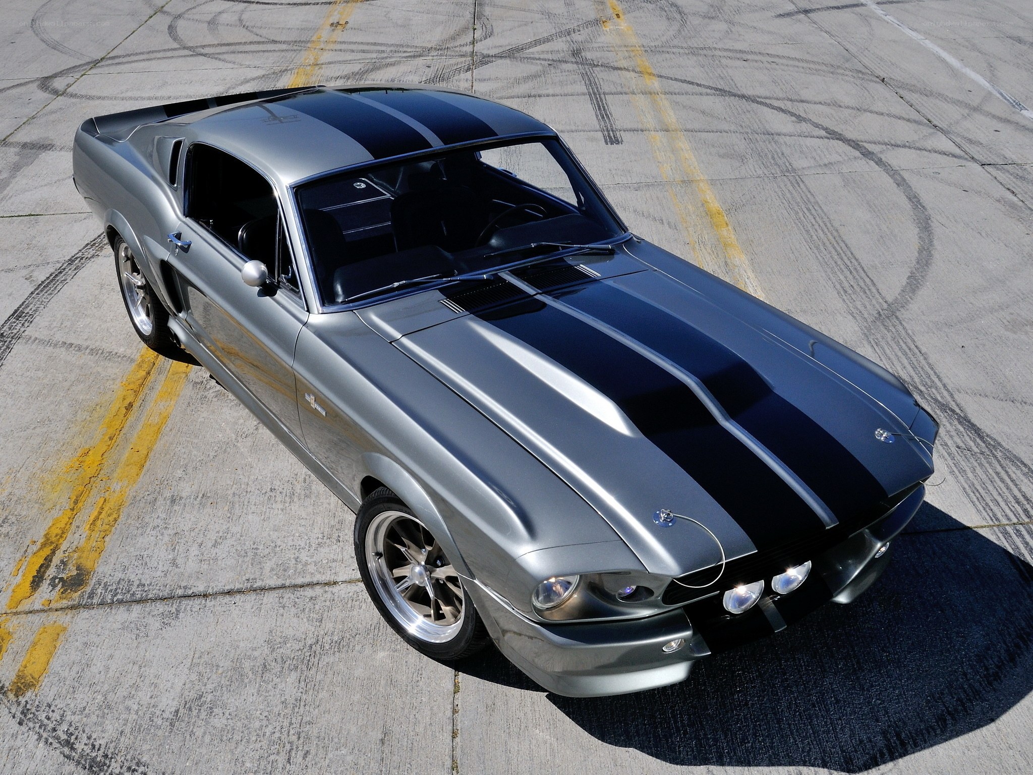 silver muscle car with black stripes