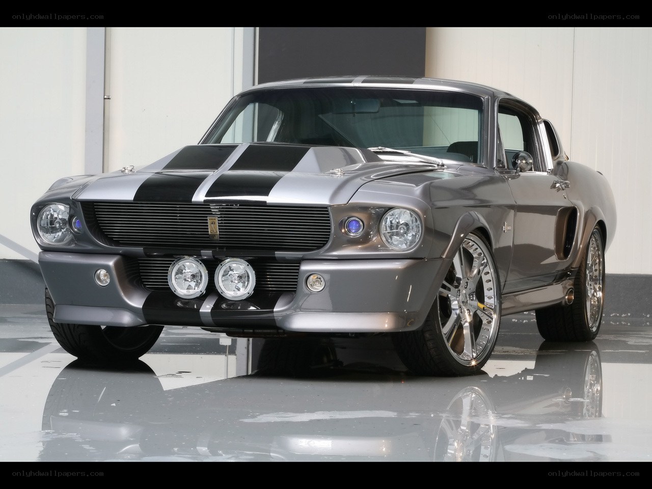 silver muscle car with stripes