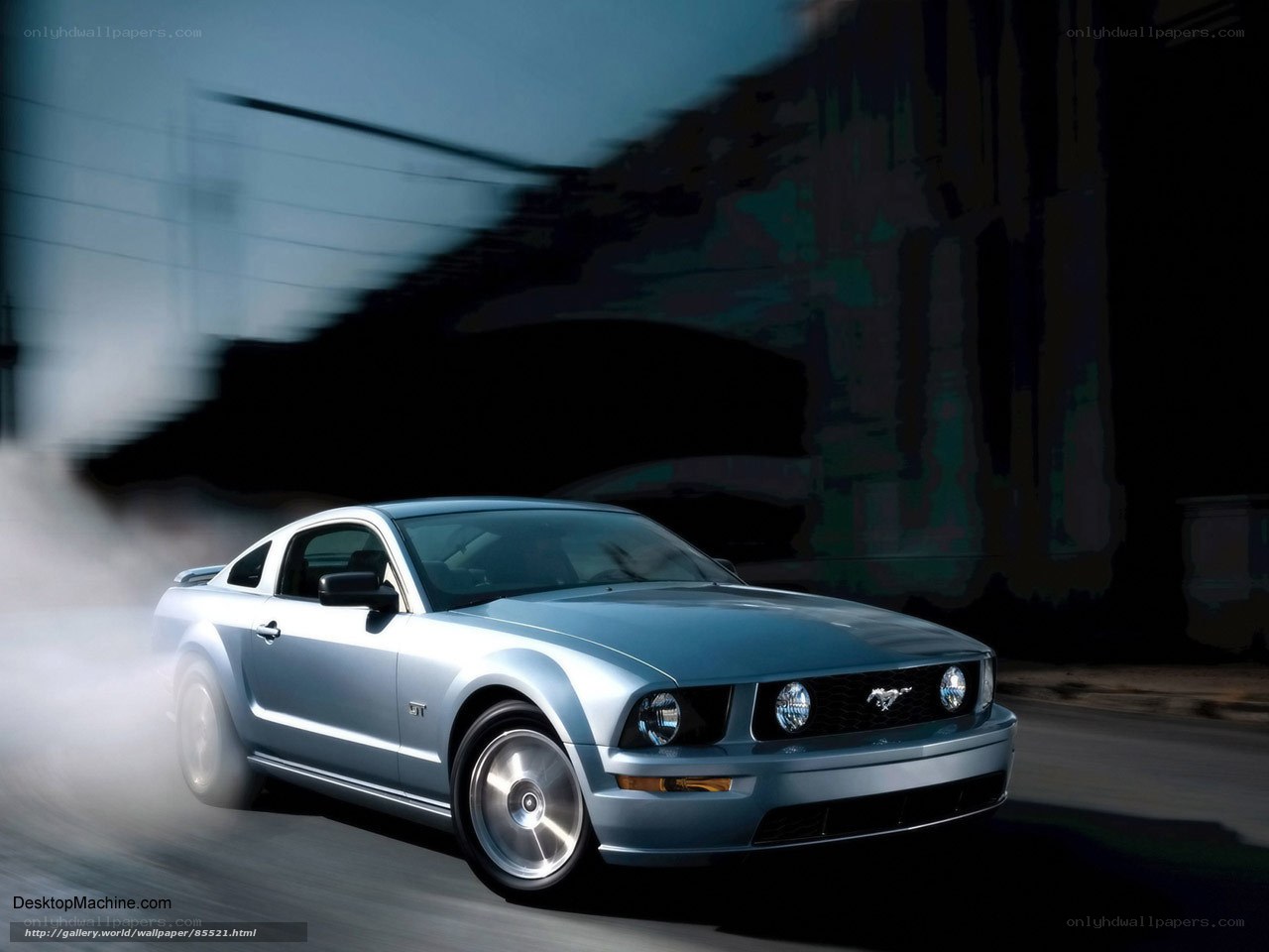 silver mustang in motion