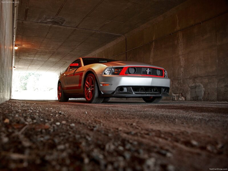 silver mustang in tunnel