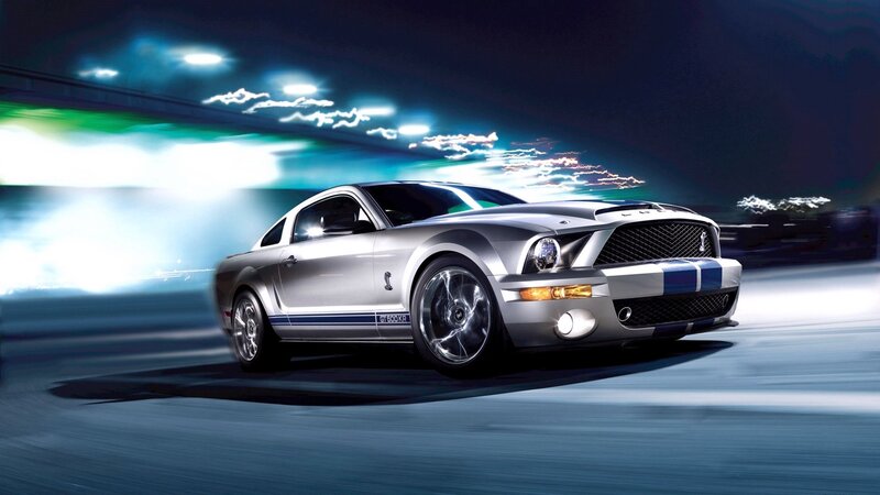 silver mustang on a track