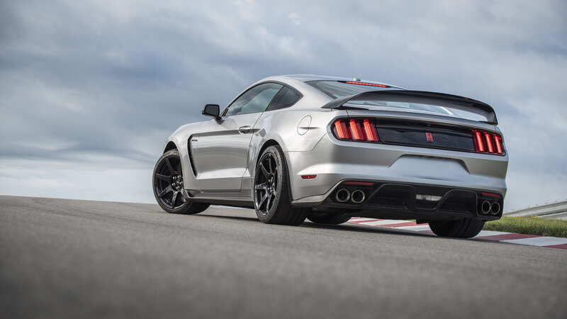Silver Mustang on Track — Dramatic