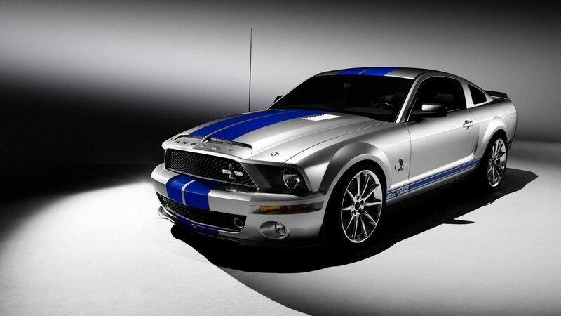 silver mustang with blue stripes