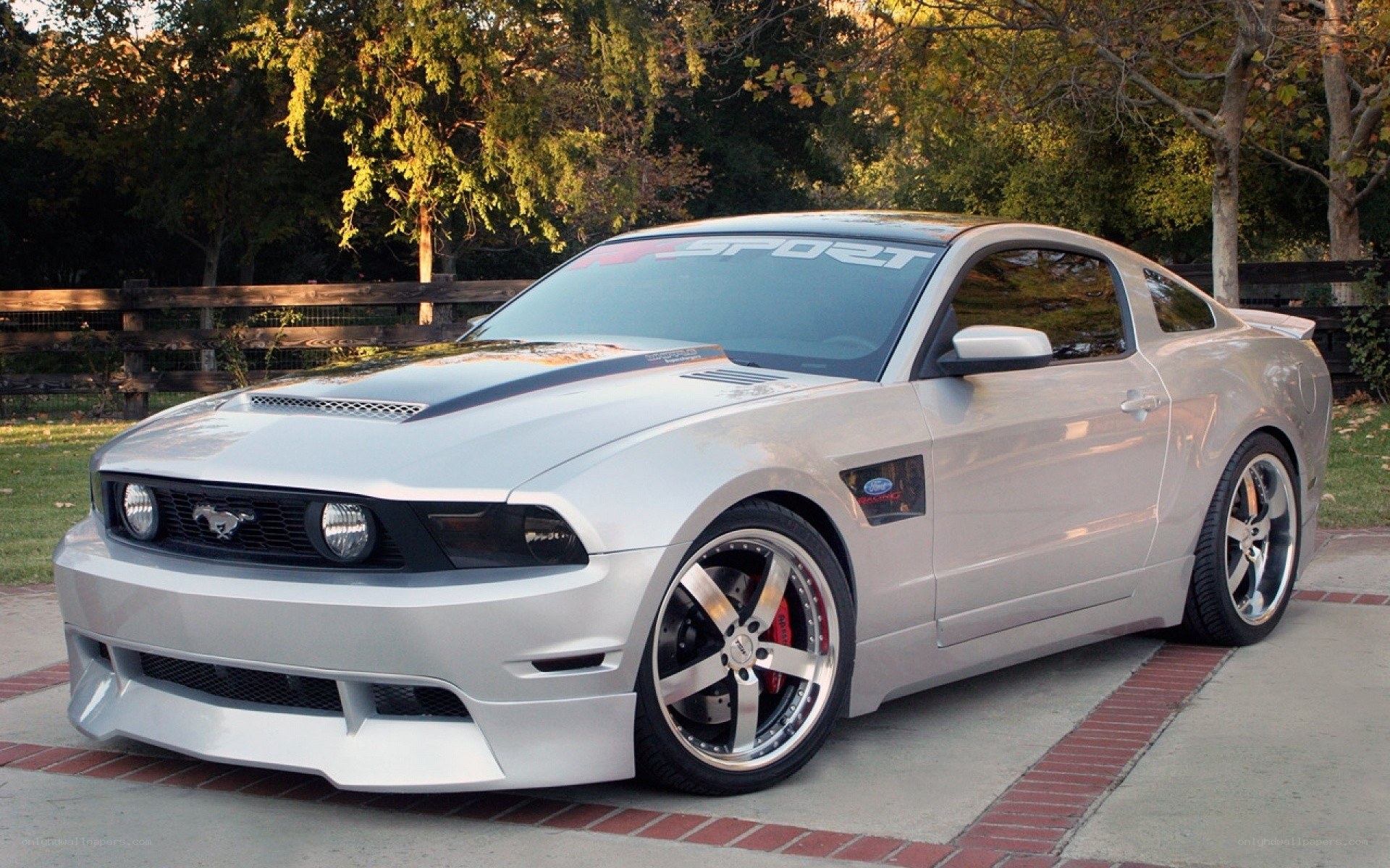 silver mustang with custom wheels