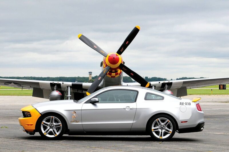 Silver Mustang with propeller plane