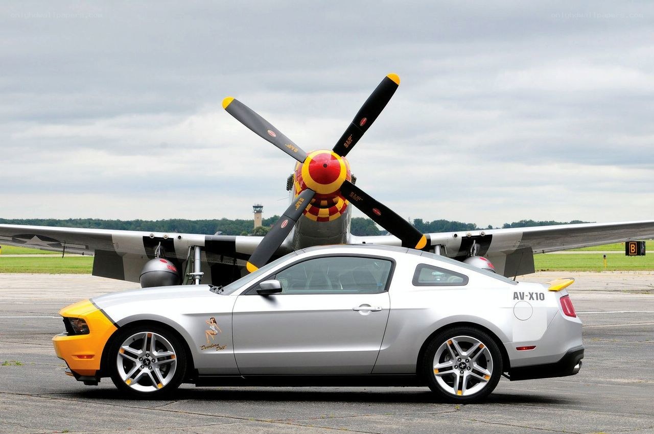 Silver Mustang with propeller plane