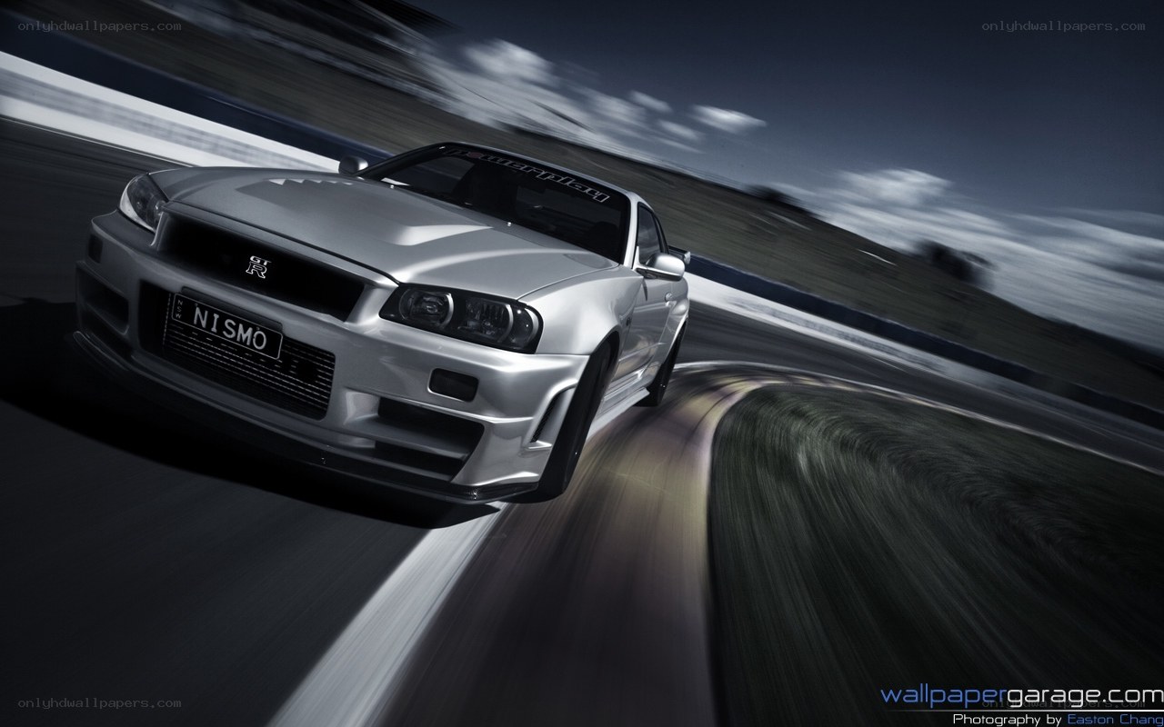 silver nismo car on track