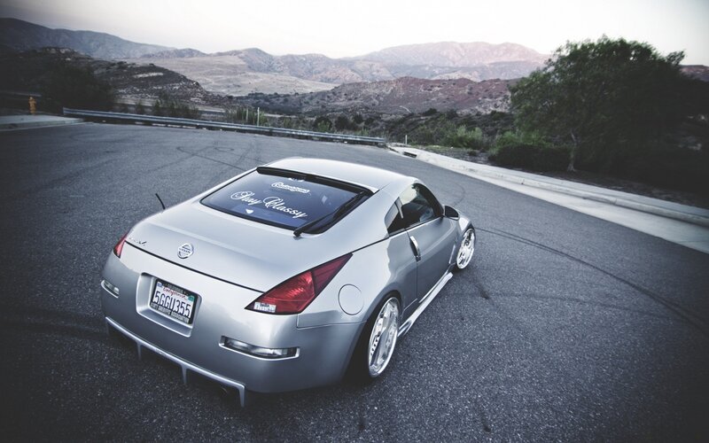 silver nissan 350z on mountain road
