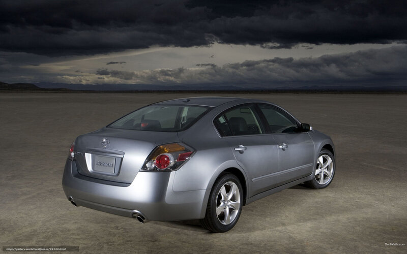 Silver Nissan Altima on desert road