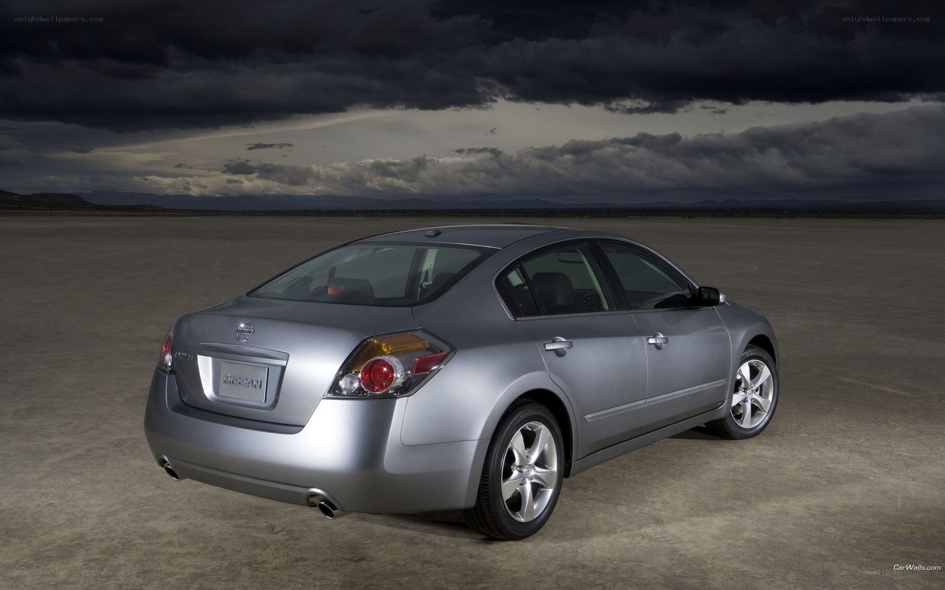 silver nissan altima on desert