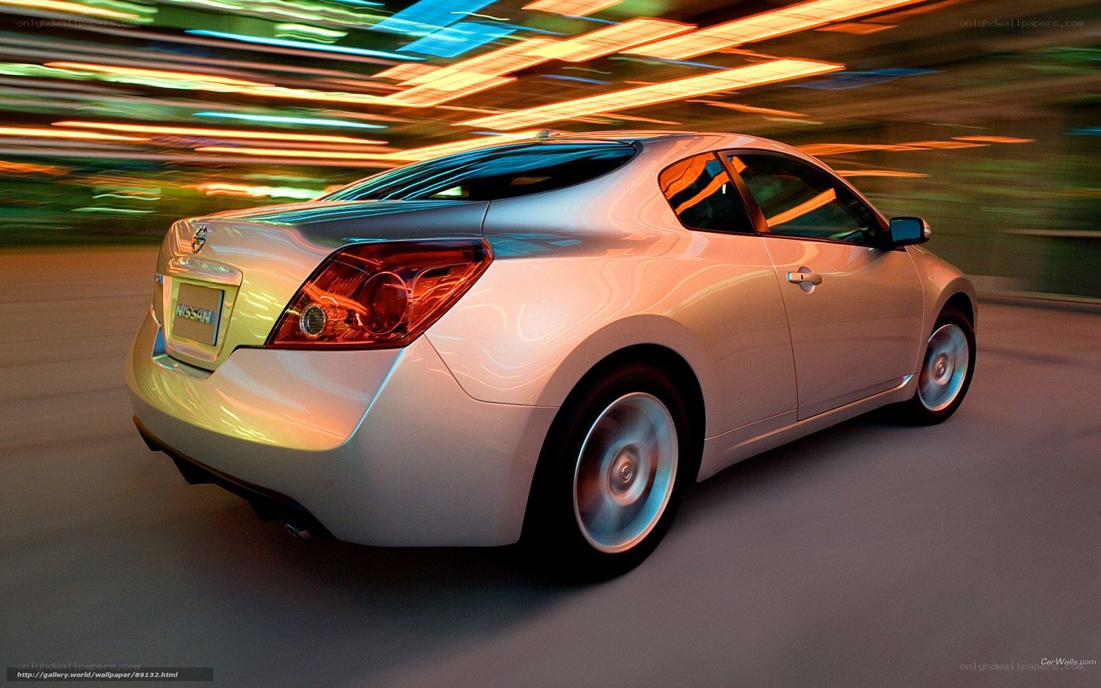 Silver Nissan Coupe in Motion