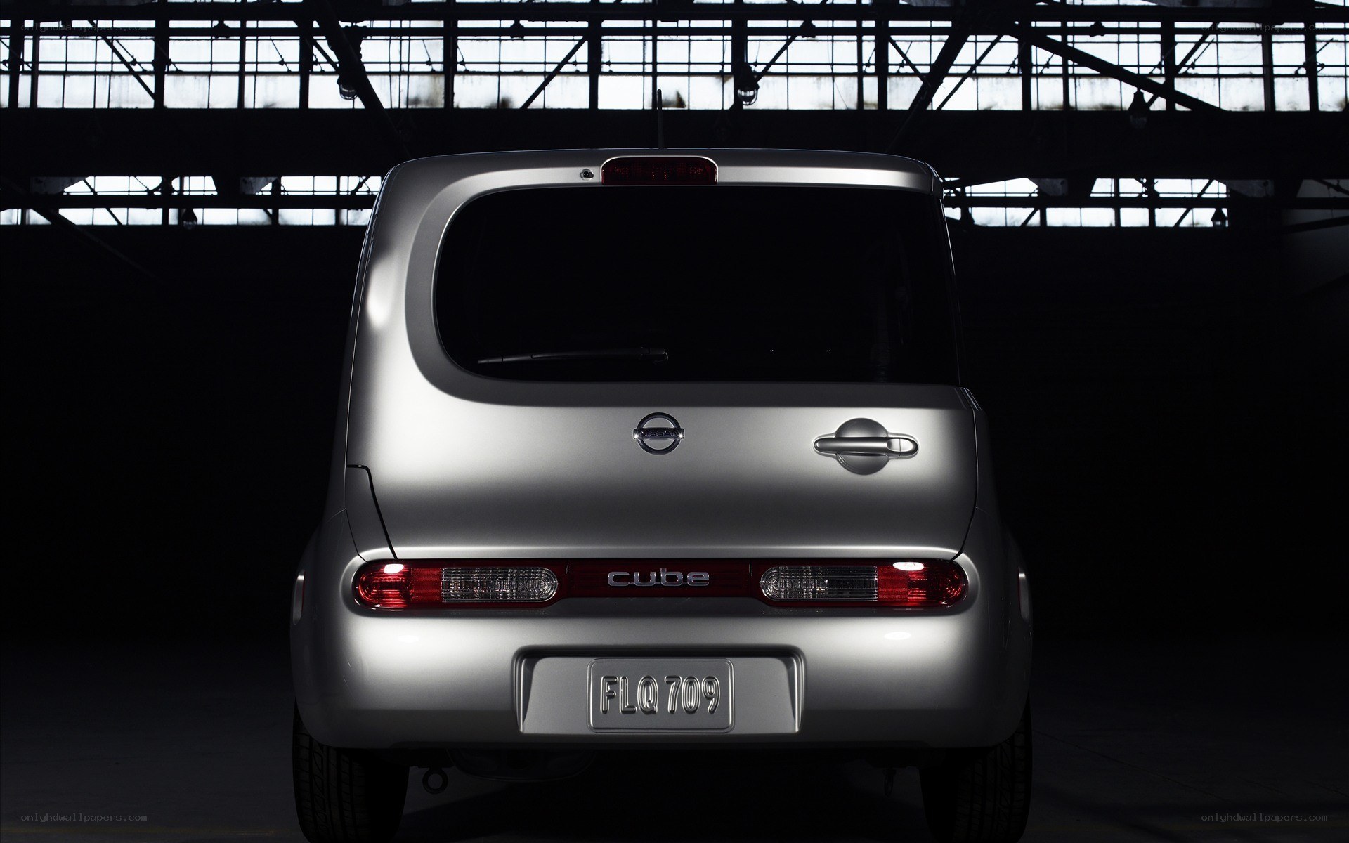 Silver Nissan Cube rear view
