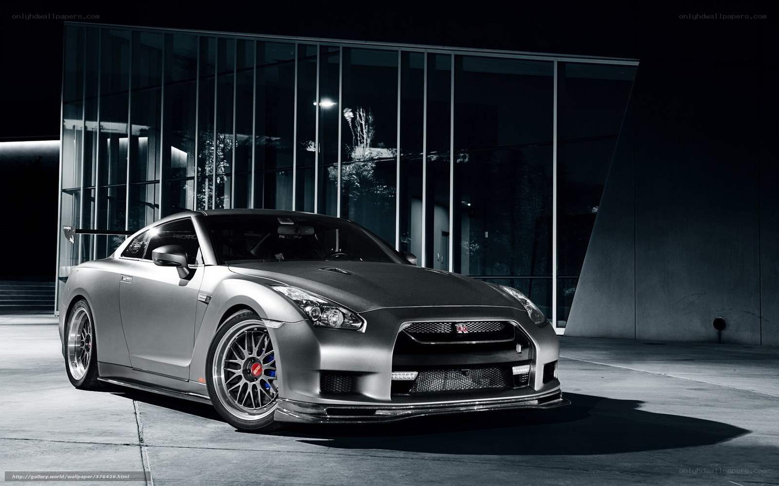 Silver Nissan GT-R at night