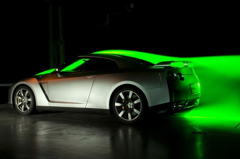 Silver Nissan GT-R in green light