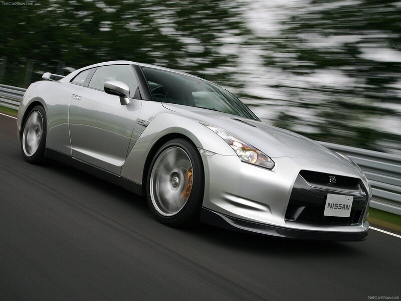 Silver Nissan GT-R in motion