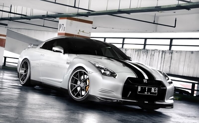 silver nissan gt-r in parking garage