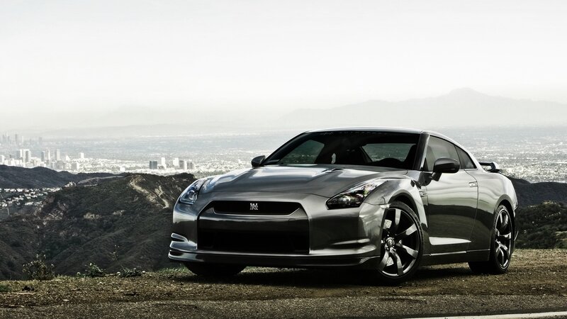 Silver Nissan GT-R on a hilltop